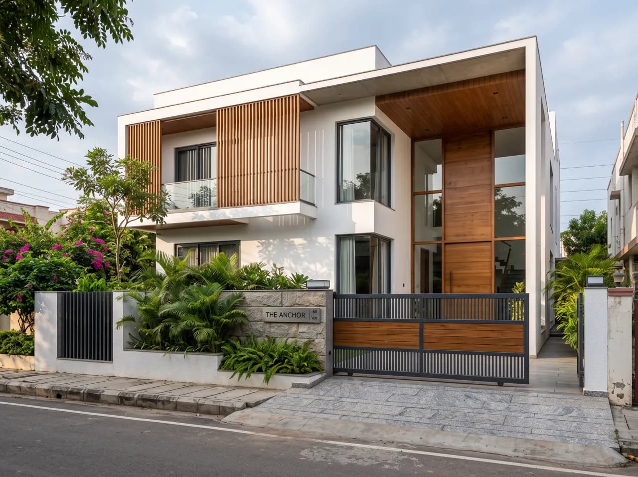 Modern white house elevation with vertical wooden louvers