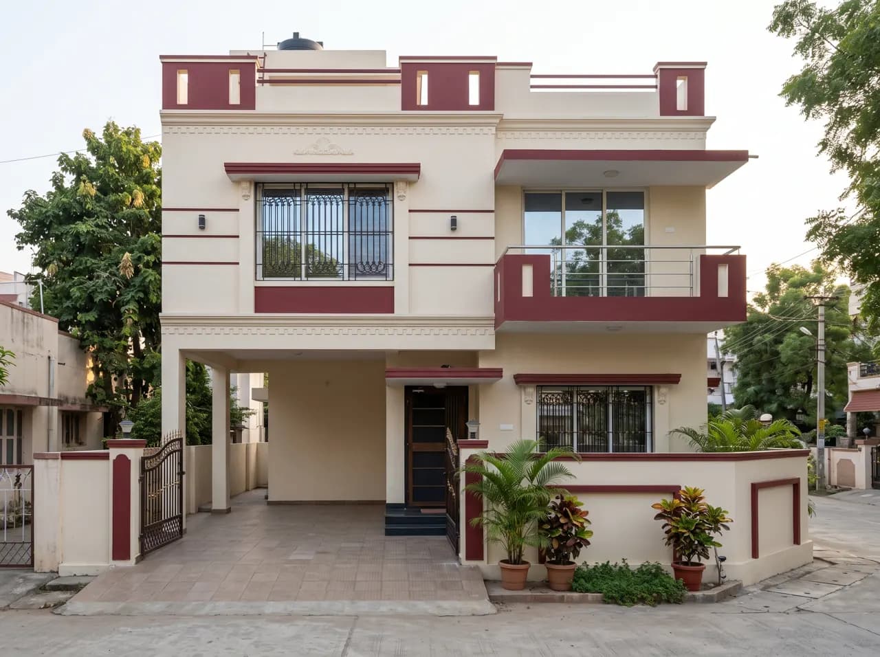 House front elevation in cream and maroon colour combination